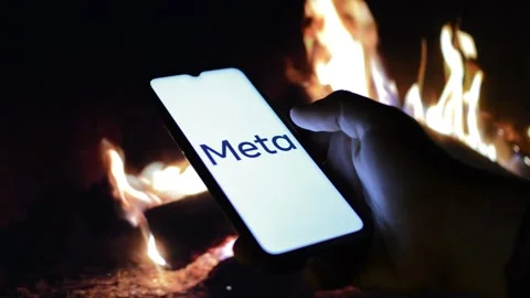 Young man with meta by facebook logo on his phone. cyberspace network Stock Footage 175211836