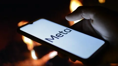 Young man with meta by facebook logo on his phone. cyberspace network Stock Footage 175211875