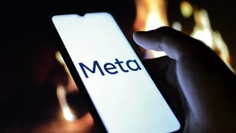 Young man with meta by facebook logo on his phone. cyberspace network Stock Footage 175211877