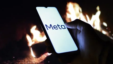 Young man with meta by facebook logo on his phone. cyberspace network Stock Footage 175211900