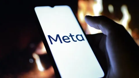 Young man with meta by facebook logo on his phone. cyberspace network Stock Footage 175211930