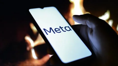 Young man with meta by facebook logo on his phone. cyberspace network Stock Footage 175211979
