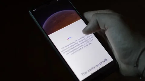 Young man with meta by facebook logo on his phone. cyberspace network Stock-Footage 175685301