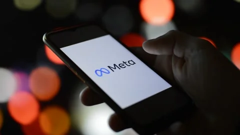 Young man with meta virtual app by facebook on his phone. metaverse cyberspace Stock Footage 172186023