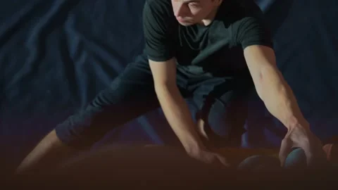 Young man millennial climber climbs the climbing wall, moves towards the camera Stock Footage 240987330