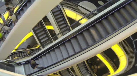 Young man with mobile phone on the escalator. Stock Footage 24865073