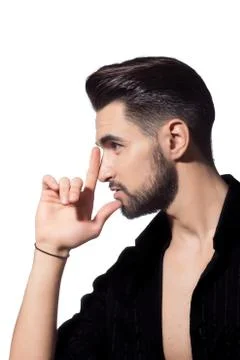 Young man model posing profile hand Stock Photos