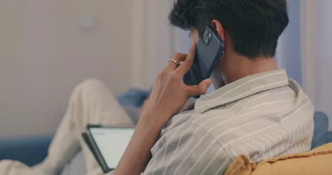 Young Man Multitasking at Home Office. Stock Footage 273840153