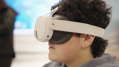 Young Man Navigating Interface with Augmented Reality Glasses Video stock 320171357