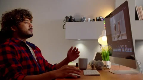 Young man is not happy with work result. Video editor gets annoyed during Video stock 240624915