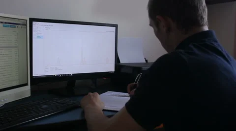 Young man at office Stock Footage 55533881