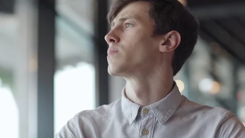Young man opening laptop computer Stock Footage 111758756