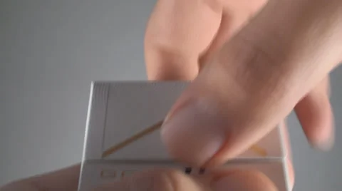 Young Man Opening A Pack Of Cigarettes And Taking One Out, Addiction, Smoking Stock Footage 36793156