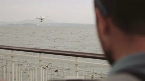 Young man operating drone Video stock 237633589