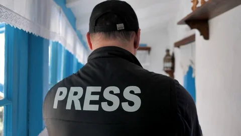 The young man, the operator takes on camera the reportage Stock Footage 124703308