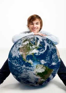 Young man over the earth Stock Photos