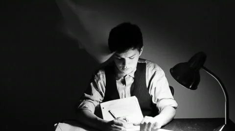 Young man overwhelmed by paperwork Stock Footage 835847