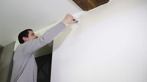 Young man painting Stock Footage 101874563