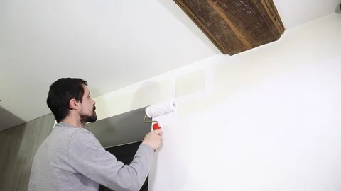 Young man painting Stock Footage 101878586