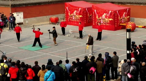 The young man perform unique skills near Dongyue Temple Stock-Footage 35801469