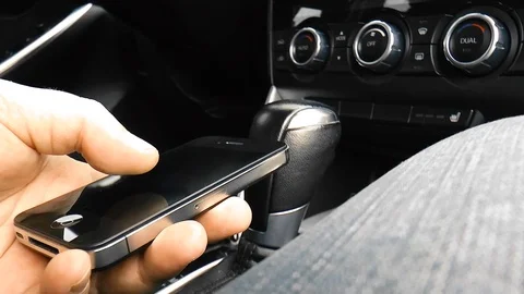 Young man with phone in hand Stock Footage 78419791