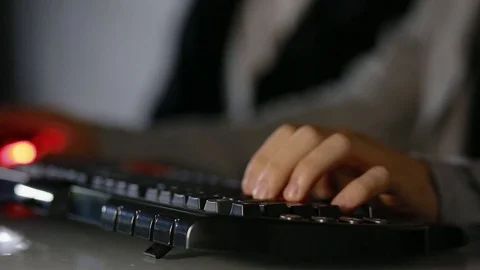 Young man play game using mouse. Closeup. Stock Footage 77408479