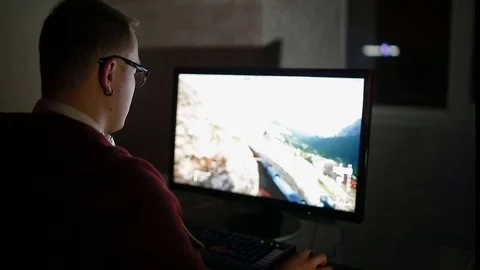 Young man play video game Stock Footage 77154635