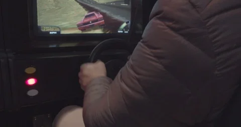 Young Man Playing An Arcade Game 3 Stock Footage 115560078