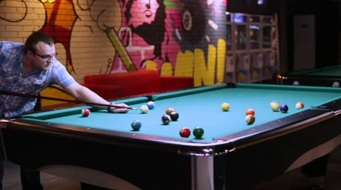 Young man playing billiard Stock Footage 58200960