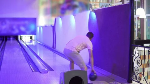 Young man playing bowling Stock Footage 80208166