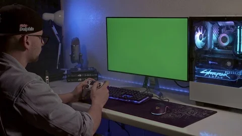A young man is playing a console. gamer is playing on the gamepad. gamer pla Stock Footage 127058852