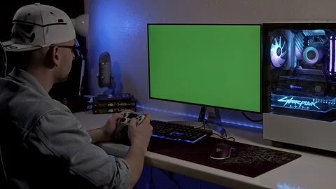 A young man is playing a console. gamer is playing on the gamepad. gamer pla Stock Footage 127059018