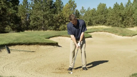 Young man playing golf Stock Footage 76236405