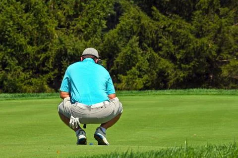 Young Man Playing Golf Stock Photos