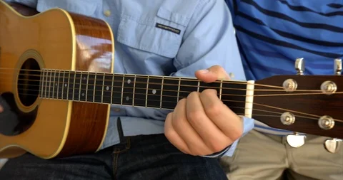 Young man playing guitar. Stock-Footage 88375400