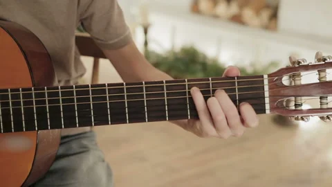Young man playing guitar 스톡 동영상 112048413