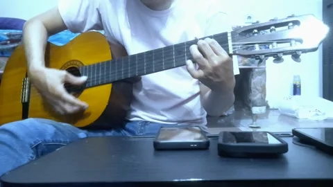 A Young Man Playing Guitar Stock Footage 331730201