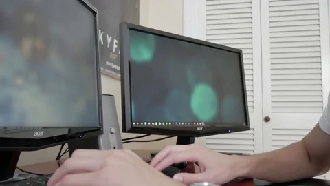 A young man playing a PC computer game 库存影片 75485851