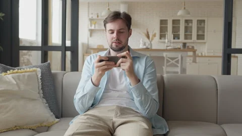 Young Man Playing Video Game, Losing The Match, And Looking Very Frustrated Stock Footage 301247308