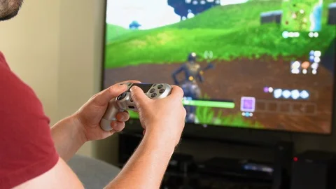 Young man playing video games Stock Footage 92241012