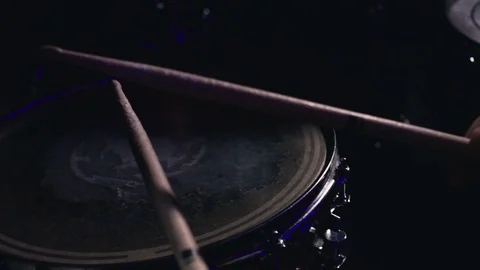 Young man plays drums close-up Stock Footage