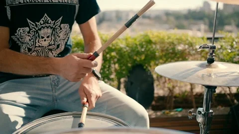 A young man plays the drums Stock Footage 231429087