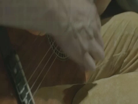 A Young man plays guitar Stock Footage 84970224