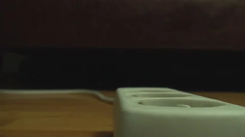 Young Man Plugs In Power Plug Extension Front Shot Vídeo Stock 33669286