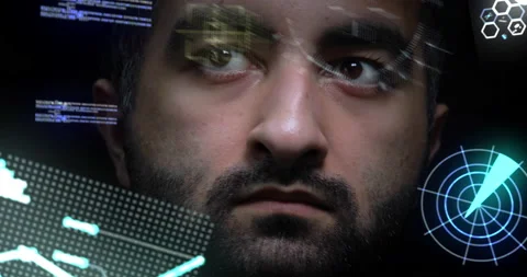 Young man plunges into augmented virtual reality. Holographic helmet inside. 動画素材 135505592