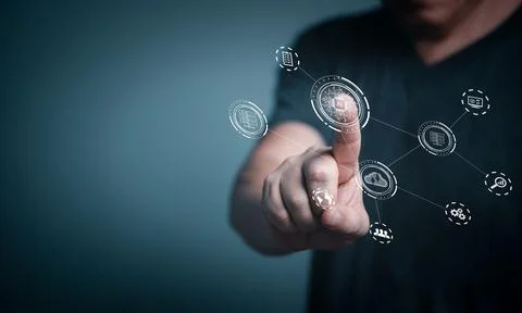 Young man pointing on Artificial Intelligence online system technology.. Stock Photos