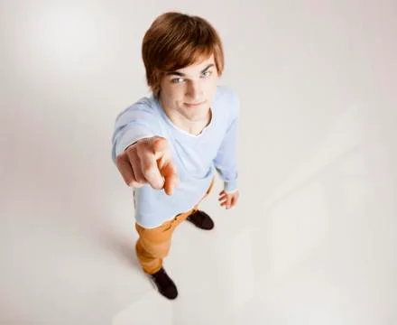 Young man pointing Stock Photos