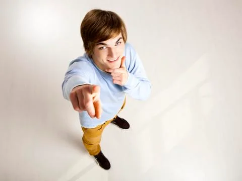 Young man pointing Stock Photos