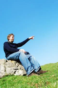 Young man pointing Stock Photos