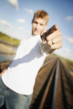 Young Man Pointing Stock Photos